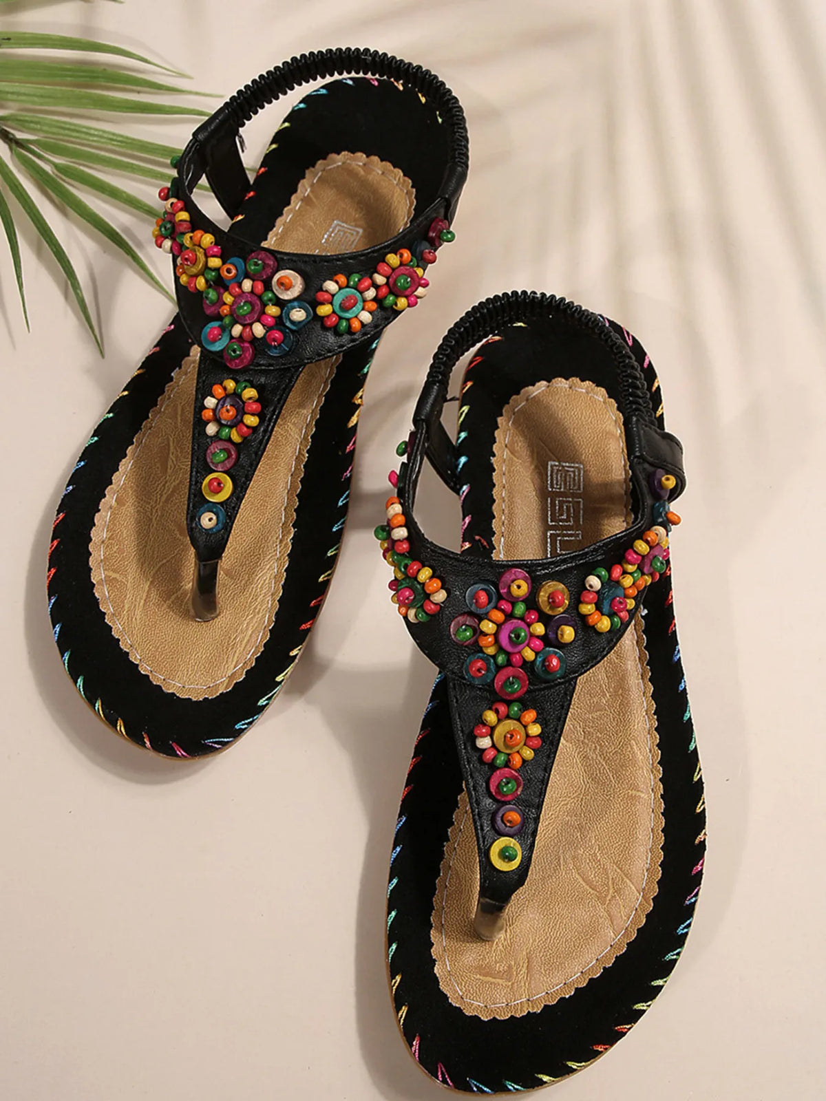 Trendsi Colorful beaded T-strap flat sandals; black straps with multicolor bead embellishments, pair.