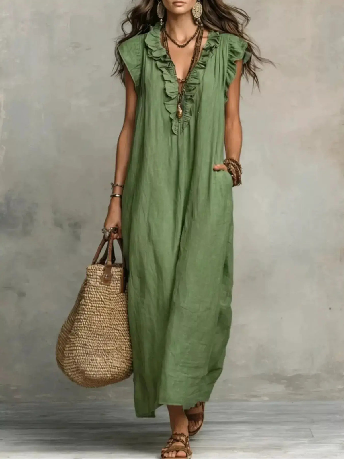 Green maxi dress with a ruffled V-neck and cap sleeves; plus size.