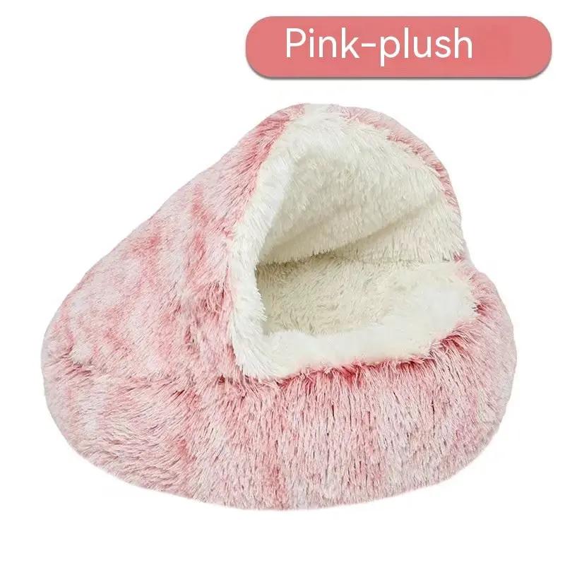 Semi-closed pink plush shell nest pet bed with white interior for small dogs and cats.