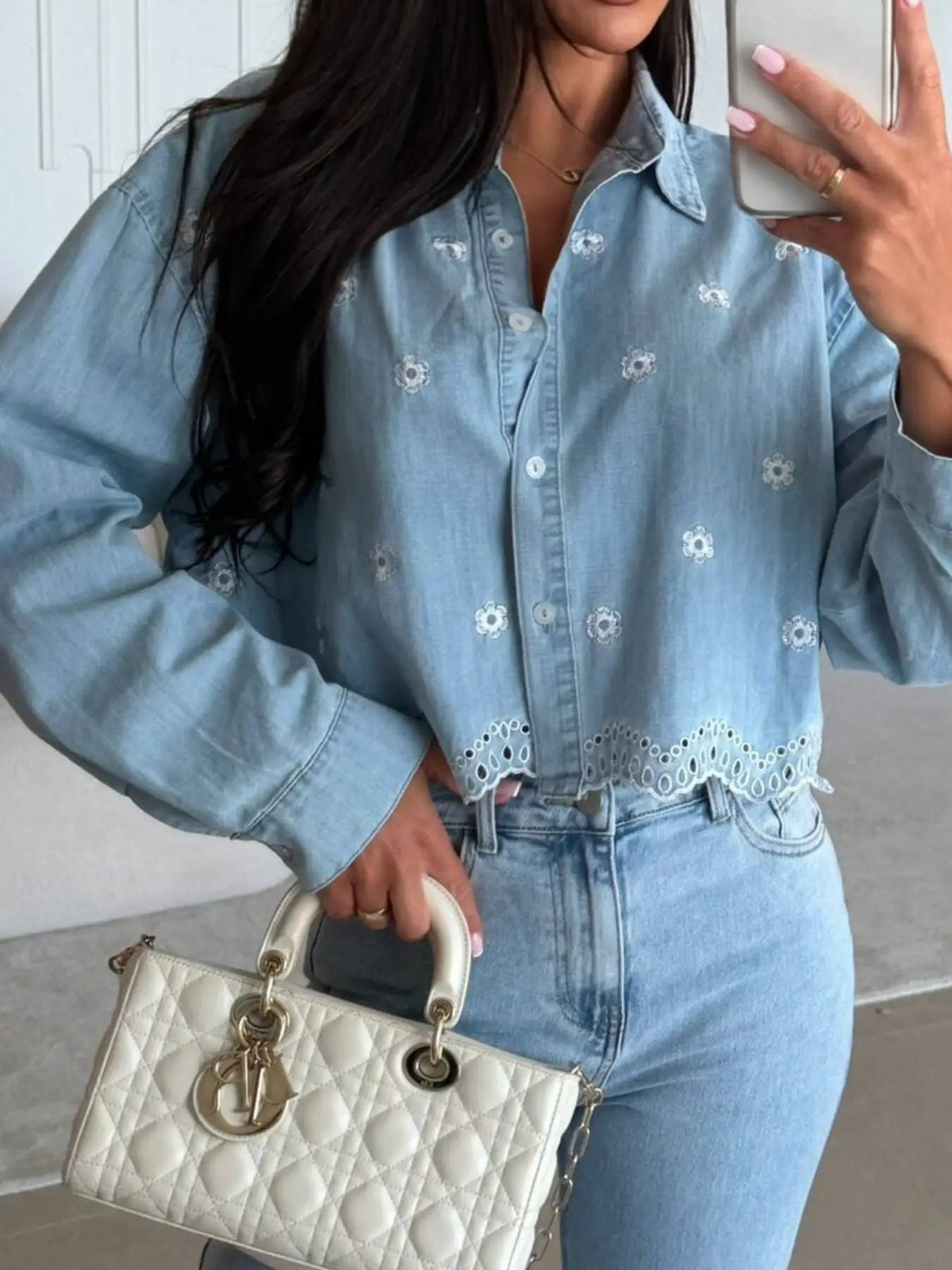Embroidered Cropped Denim Shirt by Trendsi in light blue with delicate floral embroidery and scalloped hem