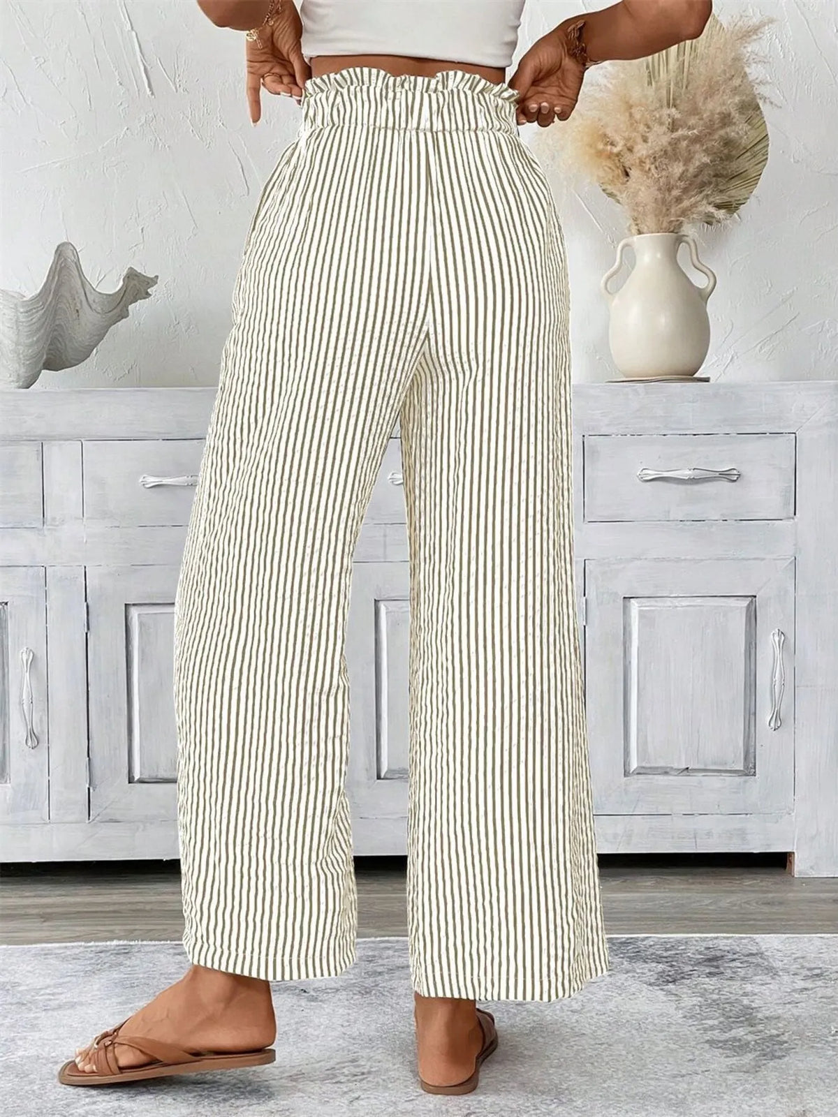 Full-size striped wide-leg palazzo pants by Trendsi, plus-size, with paper-bag waist and pockets