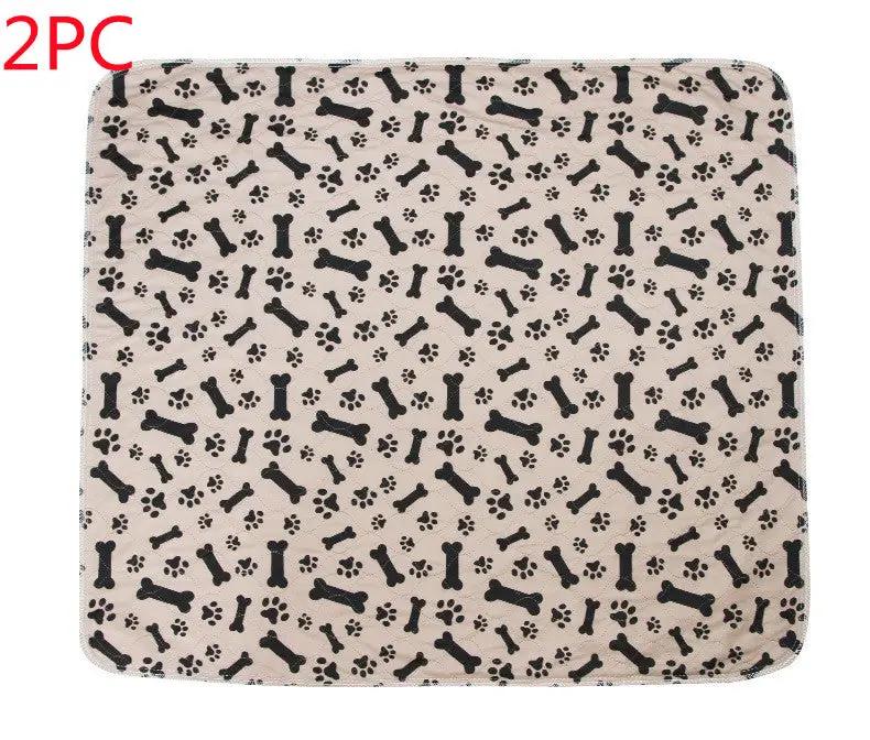Three-layer waterproof pet absorbent pad by AdTec, beige with black bone and paw print pattern, 2-pack.