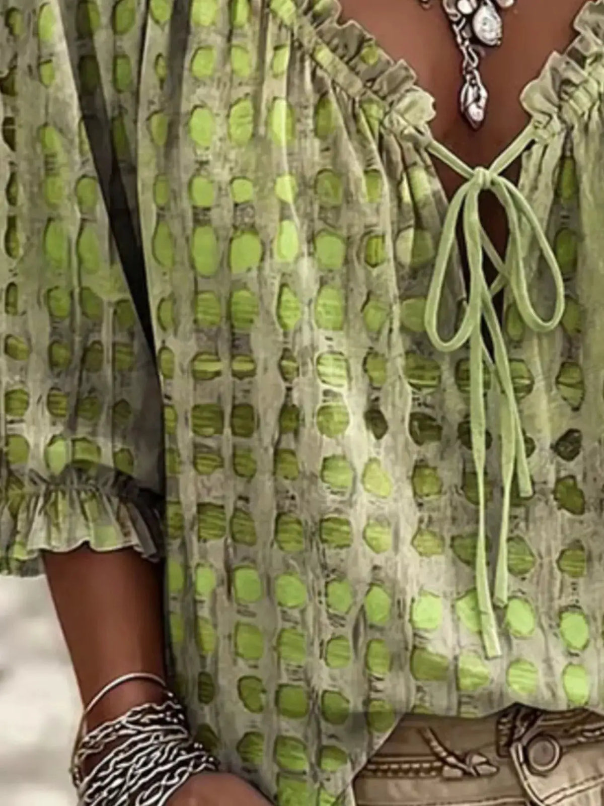 Trendsi plus-size tie-neck blouse; lime-green geometric print, sheer fabric, 3/4 sleeves