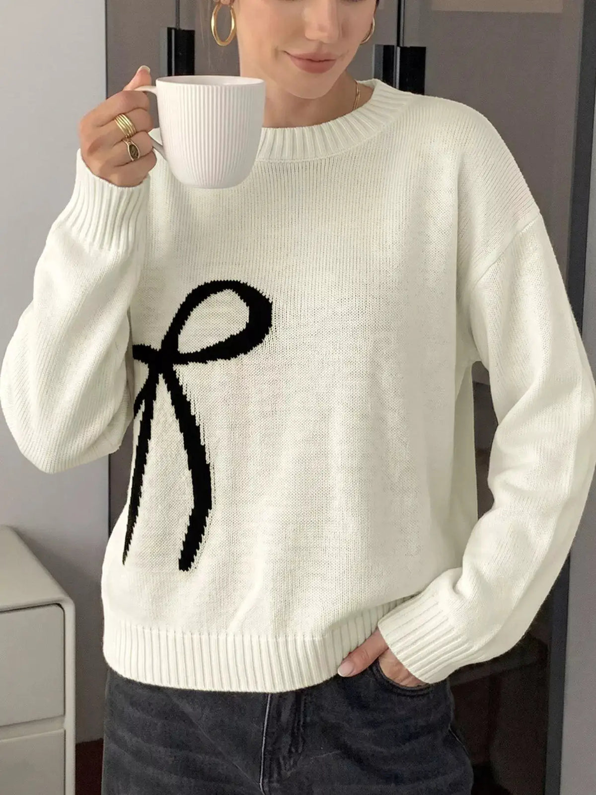 Bow Graphic Round Neck Acrylic Sweater in white with soft stretch fit