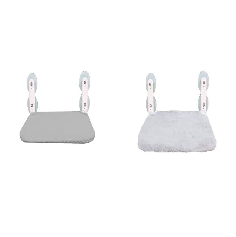 Hammock window cat bed with suction cup mounts; includes two cushions in gray and fluffy white.