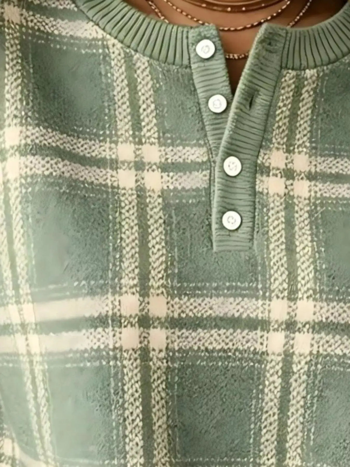 Women’s plus-size green plaid button-front sweatshirt with ribbed placket and collar