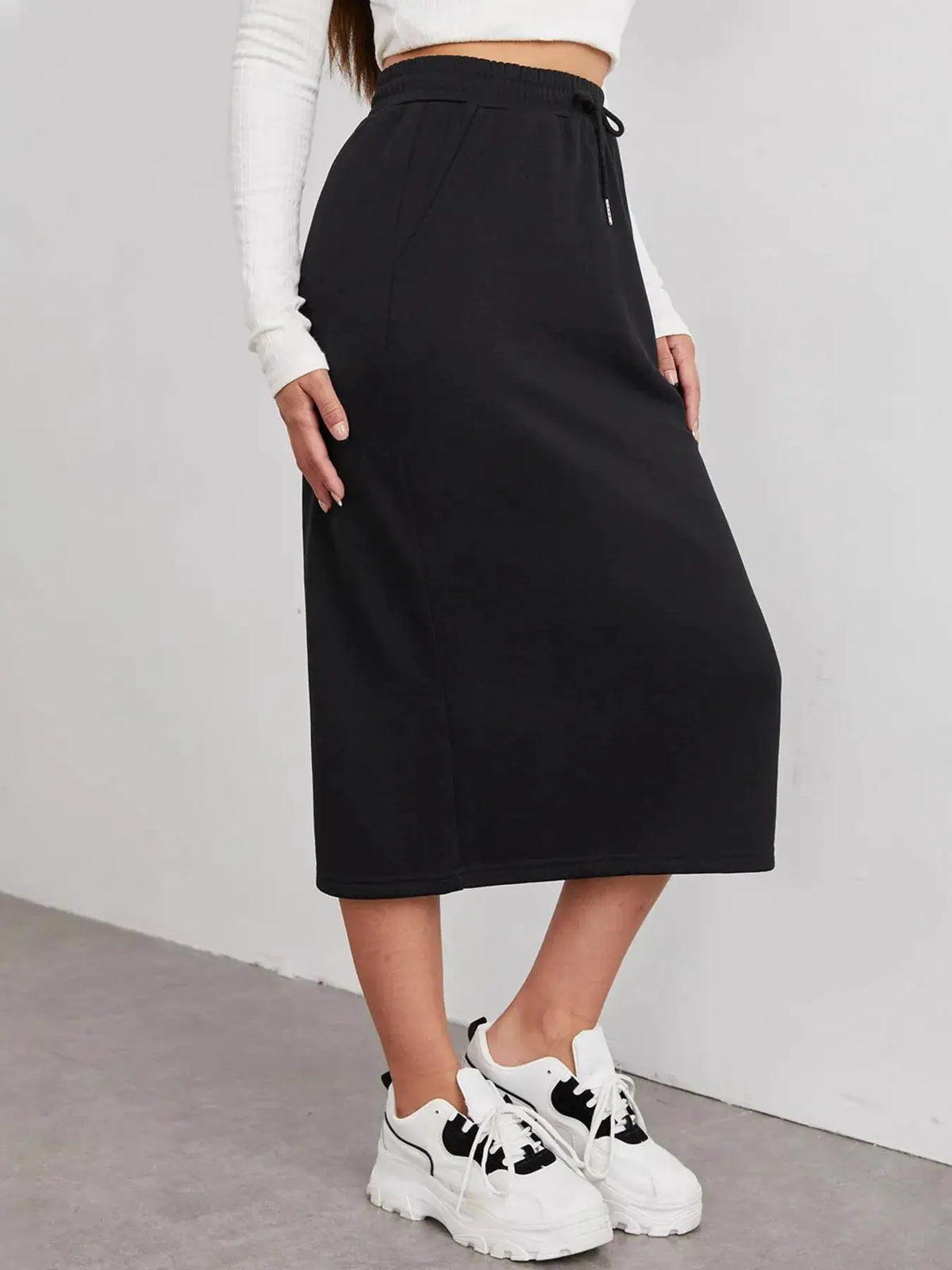 Slit Drawstring Midi Skirt by Trendsi in black with a drawstring waist