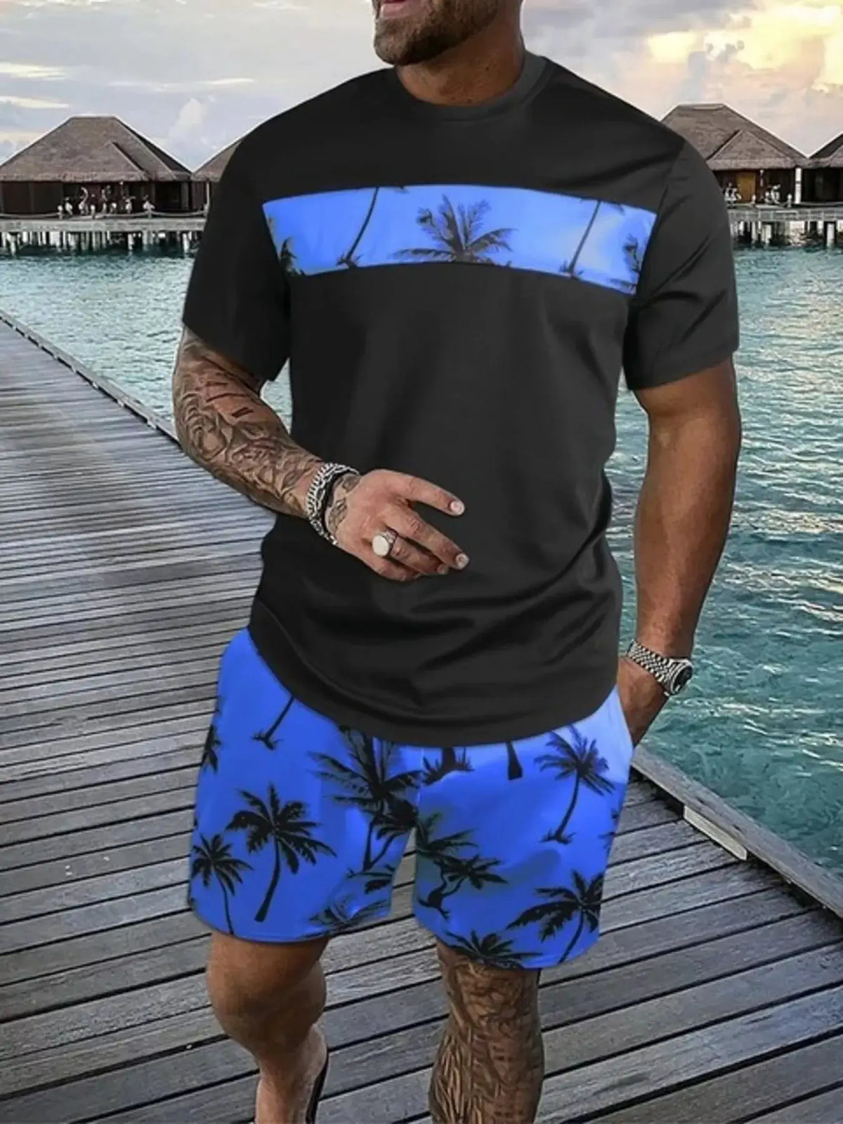 Mens Tropical Palm Tree Tee and Shorts Set; black tee with a blue palm stripe across chest and blue palm-print shorts