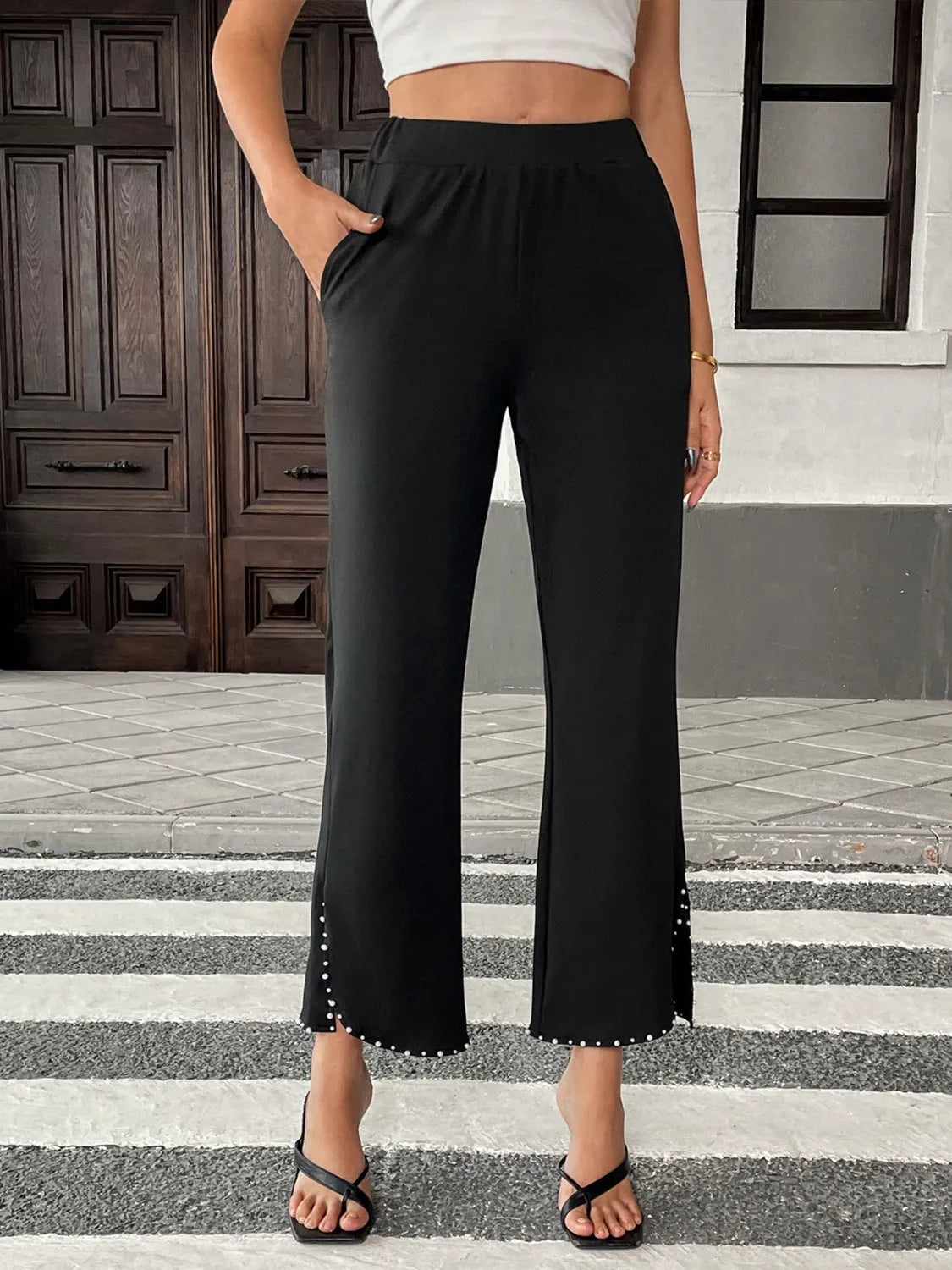 Pearl-embellished cropped wide-leg Palazzo pants in black with pearl-trim hem