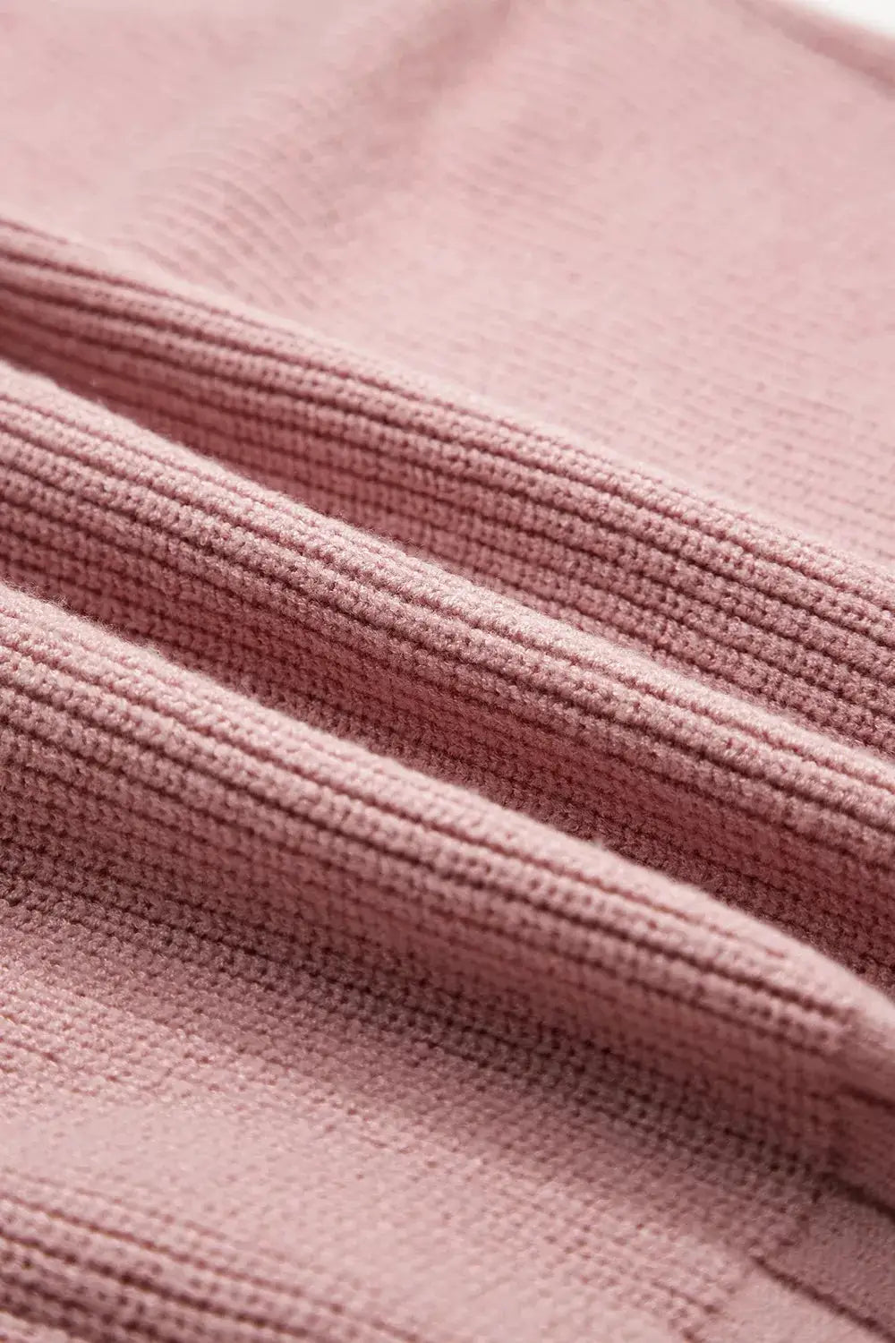 V-Neck Button-Down Cardigan in dusty pink knit fabric close-up