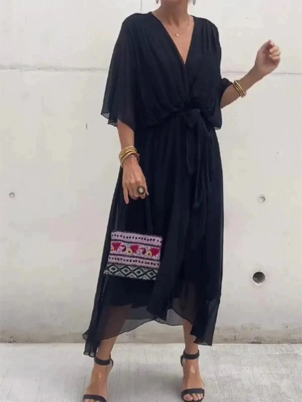 Dress: black flowy midi tie-front with flutter sleeves, plus-size by Trendsi