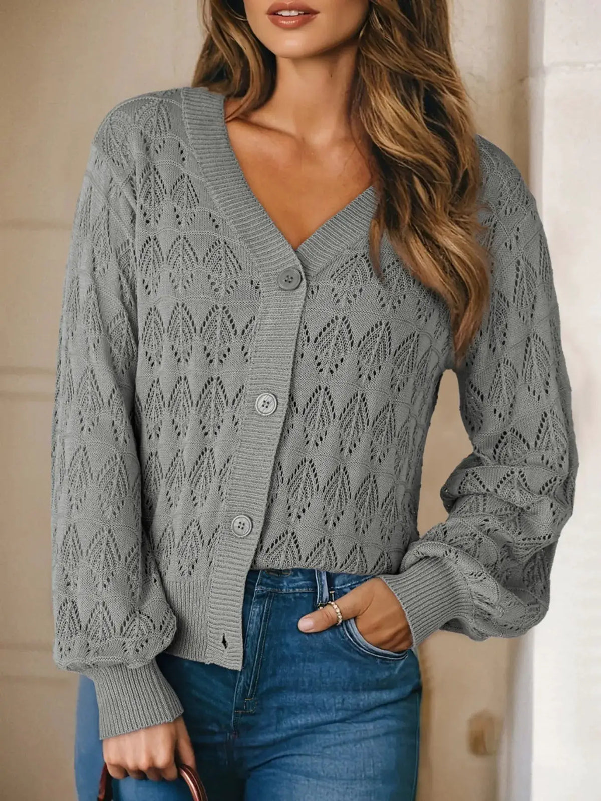 Trendsi button-front openwork cardigan with textured knit in light gray, long puff sleeves.