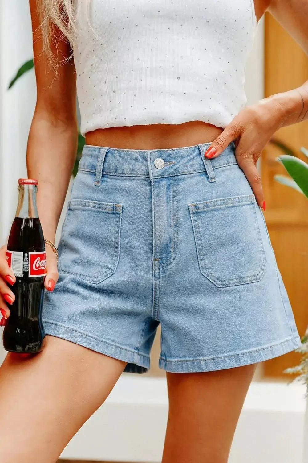 High rise patch pocket denim shorts in light wash with front pockets