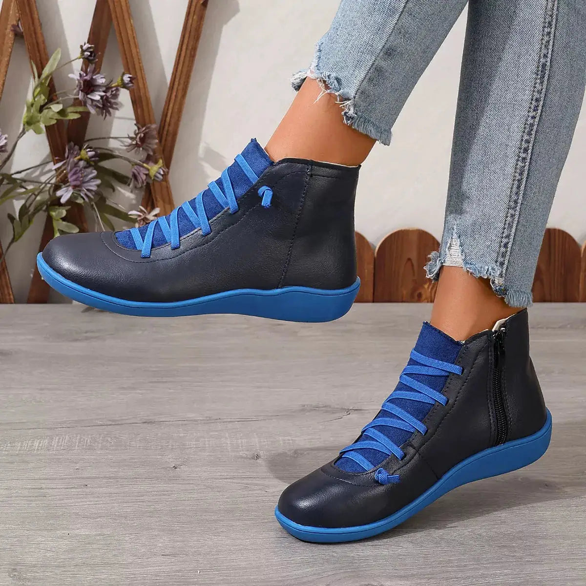 Lace-Up Faux Leather Ankle Boots by Trendsi, dark navy with electric blue laces and blue sole, pair.