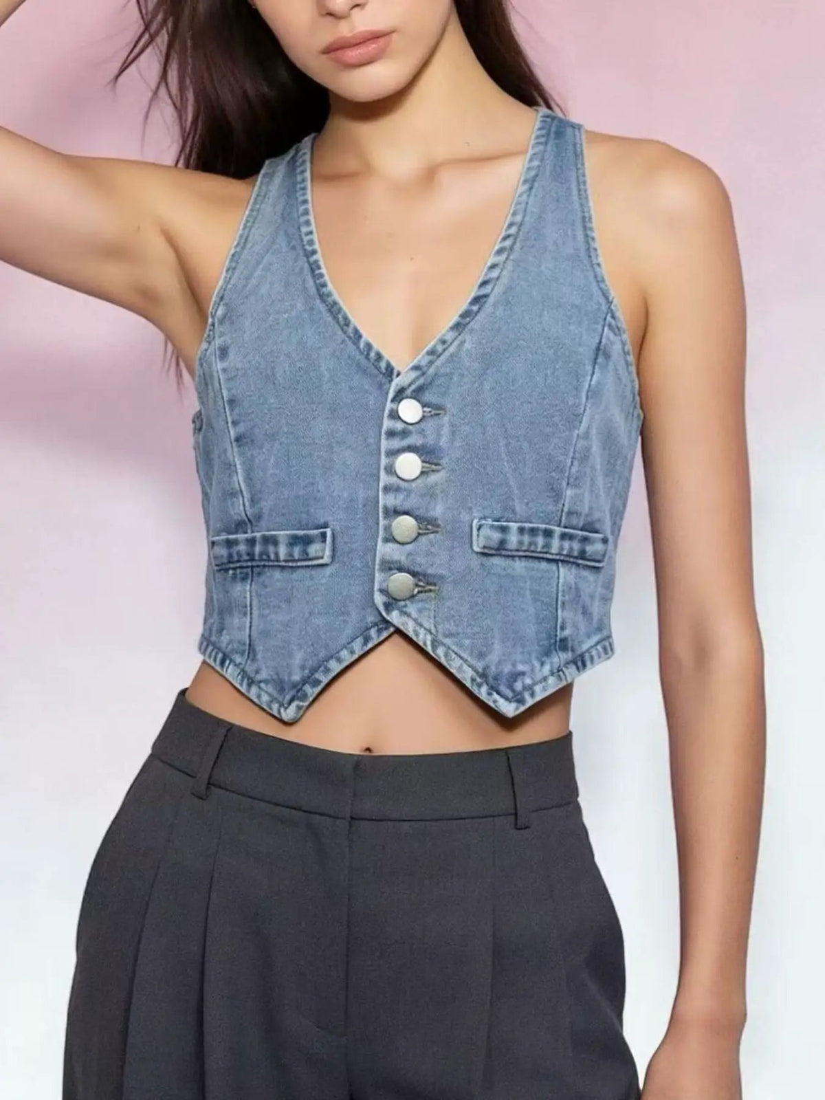 Denim vest, light-wash blue, cropped with front buttons and pockets