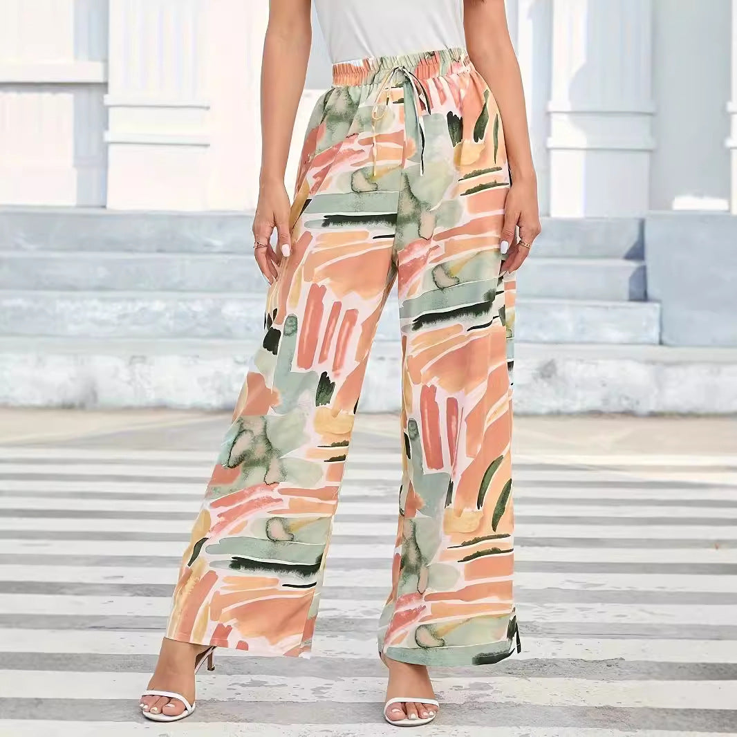 Elastic waist wide-leg pants, abstract watercolor print in peach, green, and beige, by eprolo