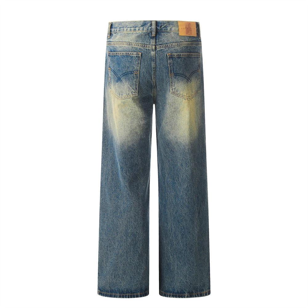 Color blocked yellow mud dyed washed denim jeans by eprolo