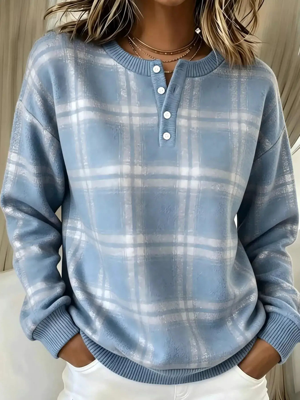 Women’s plus-size long-sleeve plaid button-front sweatshirt in blue-gray; ribbed crew neck and cuffs with four white buttons.