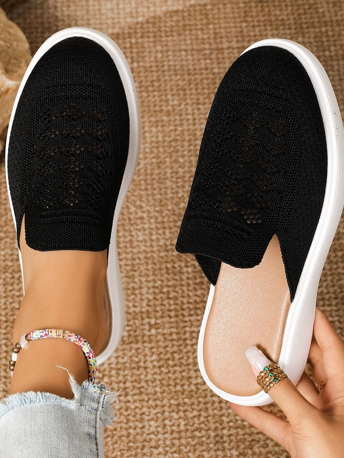 Pair of mesh round-toe platform slip-ons in black with white soles