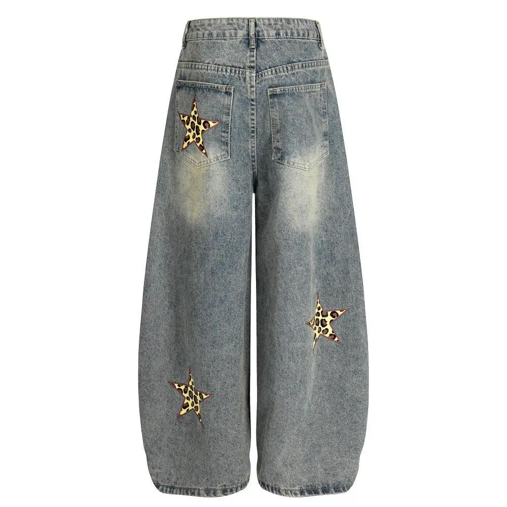 Jeans with blue denim and three leopard-print star patches on back pockets and legs.