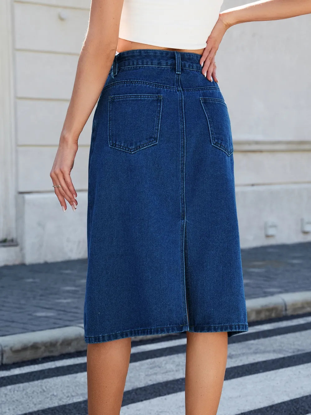 Slit Back Midi Denim Skirt by eprolo in blue denim with back pockets