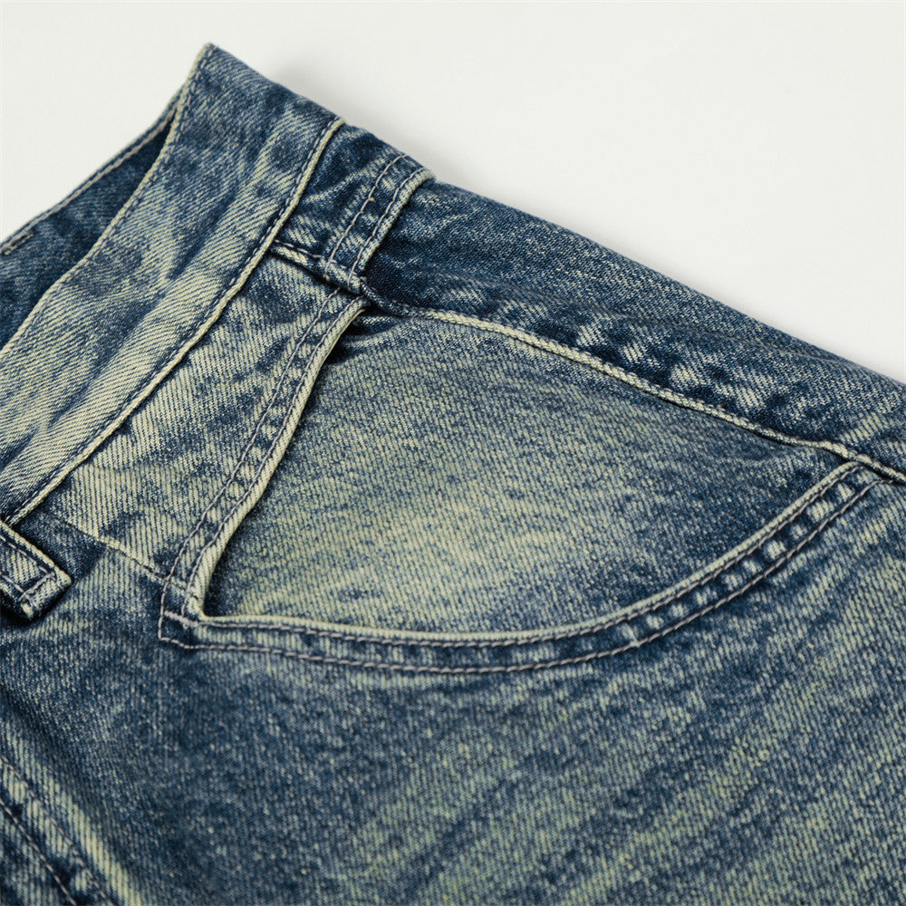 Washed denim straight-leg jeans by eprolo, blue faded denim pocket close-up