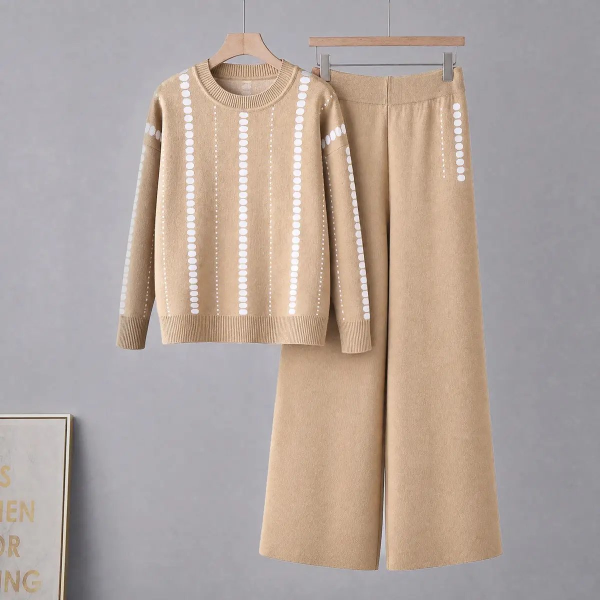 Womens coordinated two-piece beige sweater and wide-leg pants by eprolo, relaxed fit.