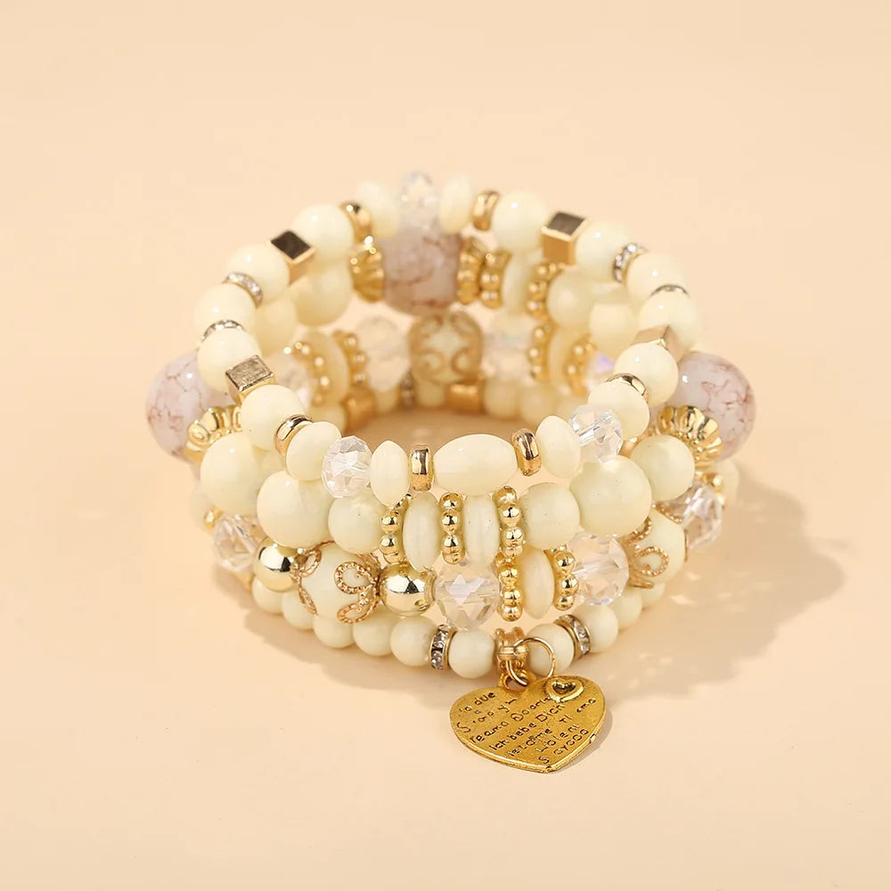 Boho crystal heart bracelet set, stackable elastic jewelry in cream beads with gold accents and crystal charms