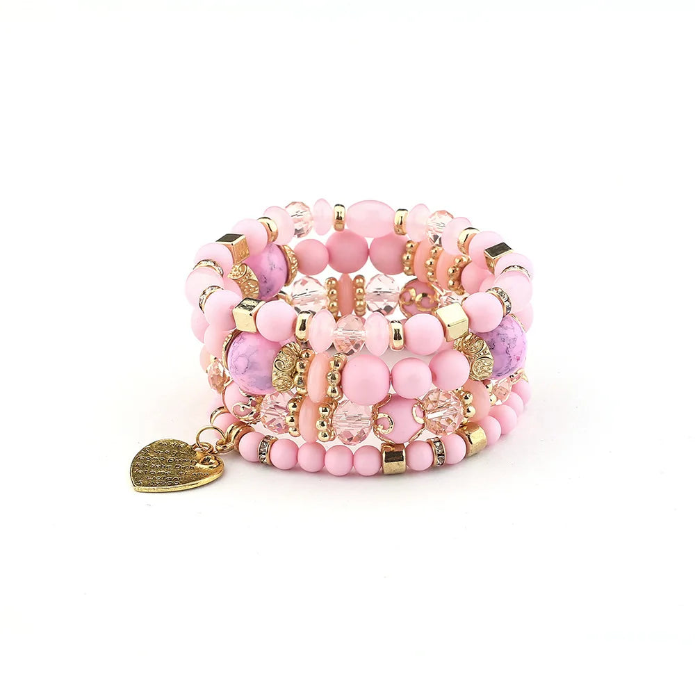 Boho crystal heart bracelet set; pink stackable elastic beaded bracelets with gold accents and heart charm