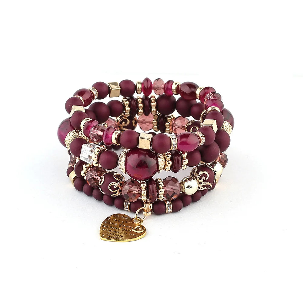 Boho crystal heart bracelet set; stackable elastic burgundy beaded bracelets with gold accents and heart charm