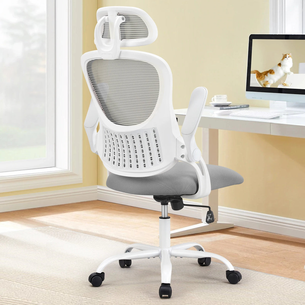 JHK mesh ergonomic office chair with white frame, flip-up arms and adjustable headrest on five-star base