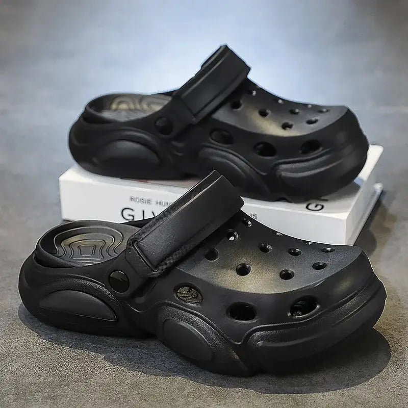Two AeroStep CloudSoft men's black breathable slippers by PrimeCanada.Store; slip-on clogs with ventilation holes