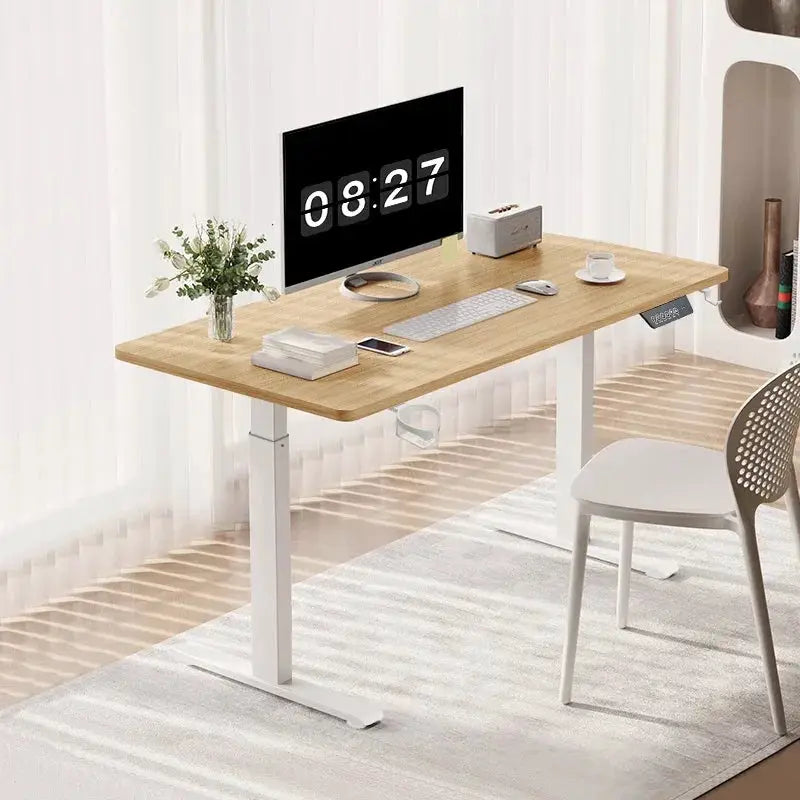 Electric height-adjustable standing desk with a wood top and white frame
