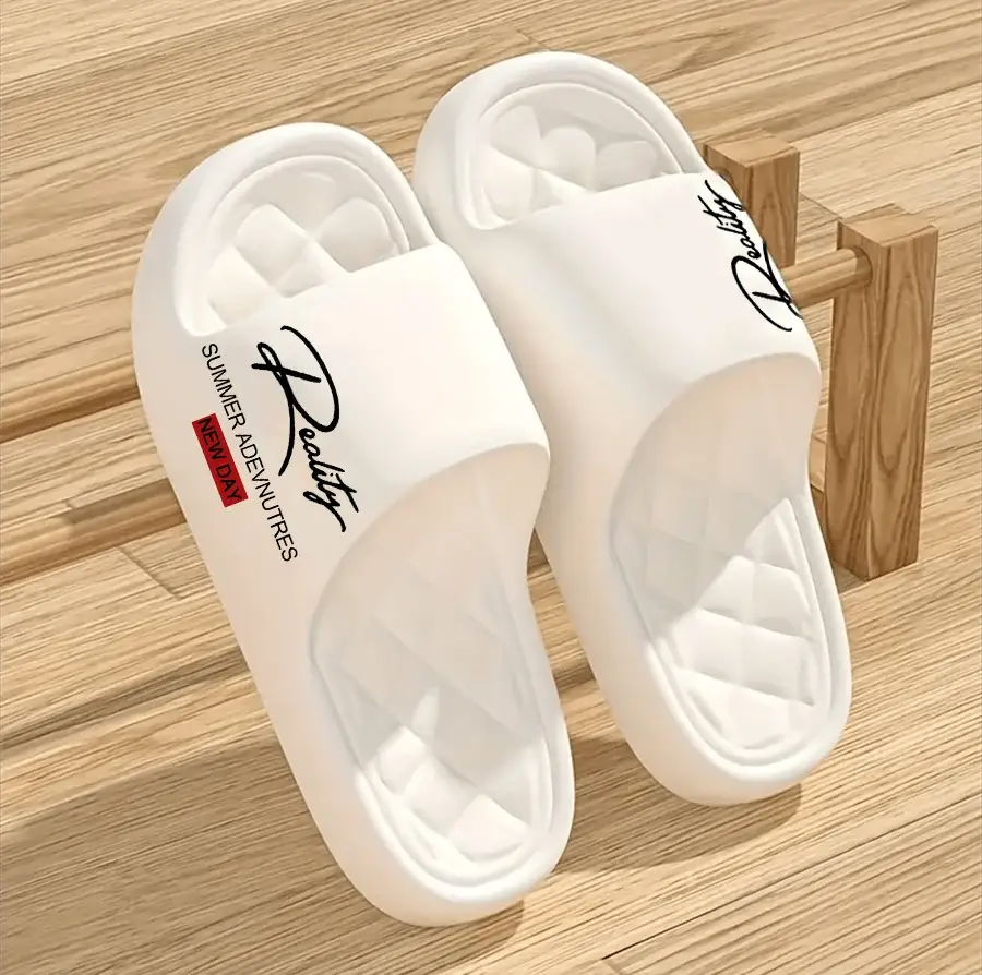 Two white AeroStep men's EVA slip-on slippers with cloud comfort on a wooden surface, PrimeCanada.Store.