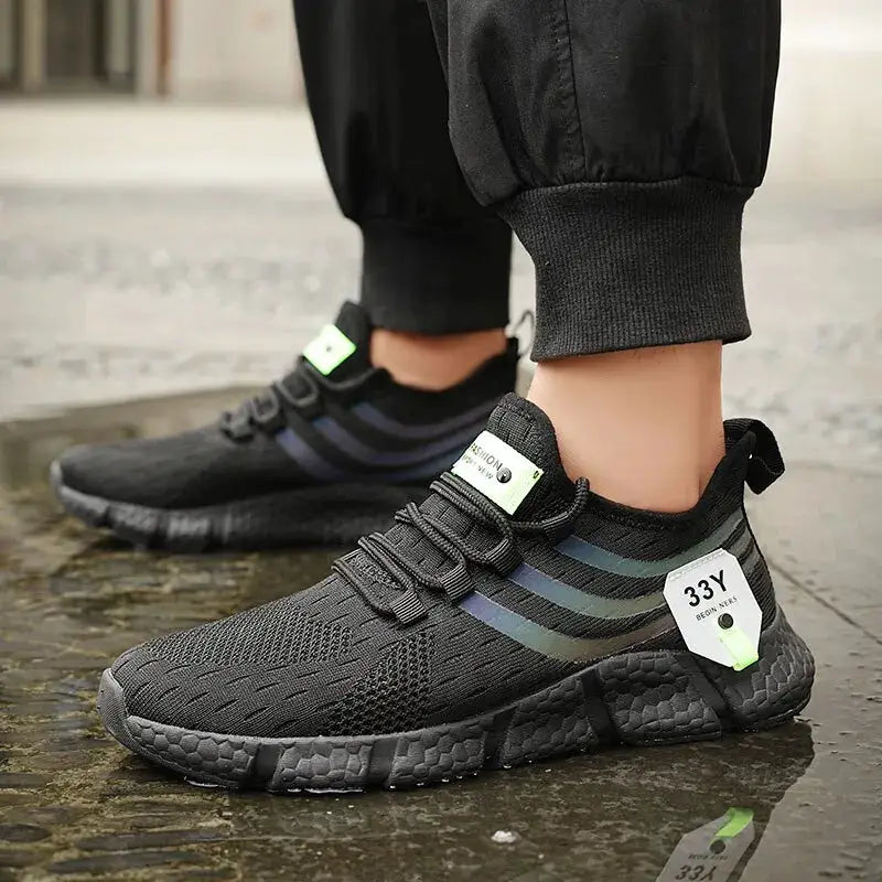 Shoes: Veloce men's breathable lightweight casual sneakers, black knit upper with striped sides.