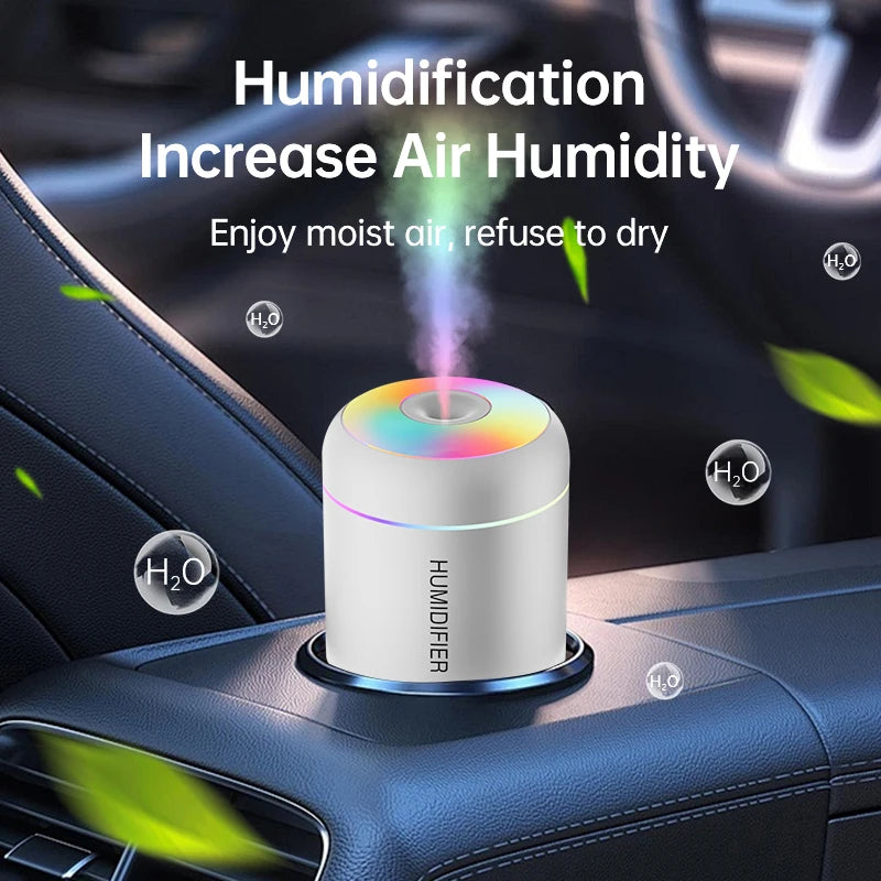 White mini USB air humidifier with RGB LED lights for car or home.