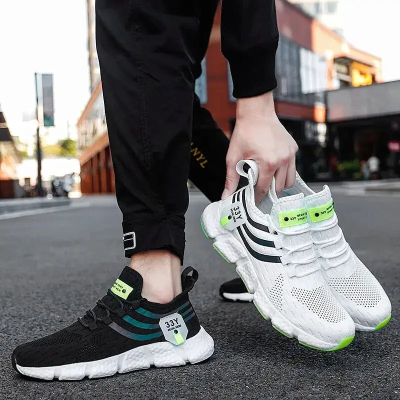Veloce Men's Navy Breathable Lightweight Casual Sneakers pair in black and white with neon green accents
