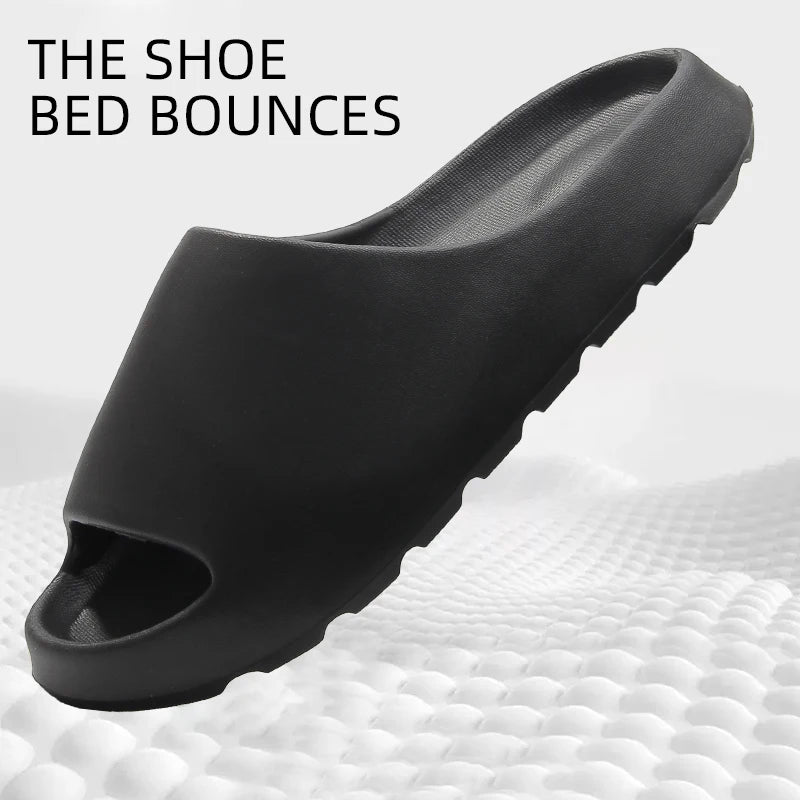 Men's black EVA anti-slip slippers with a ridged sole.
