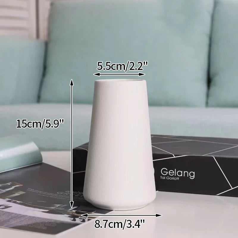 Ceramic flower vase, white retro desktop ornament; 15 cm tall, top opening 5.5 cm, base diameter 8.7 cm.