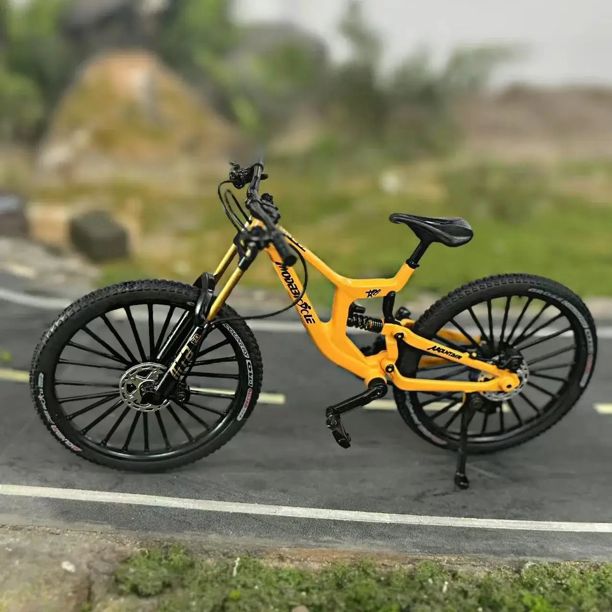 1:8 scale alloy European mountain bike model in orange with dual suspension and realistic gears
