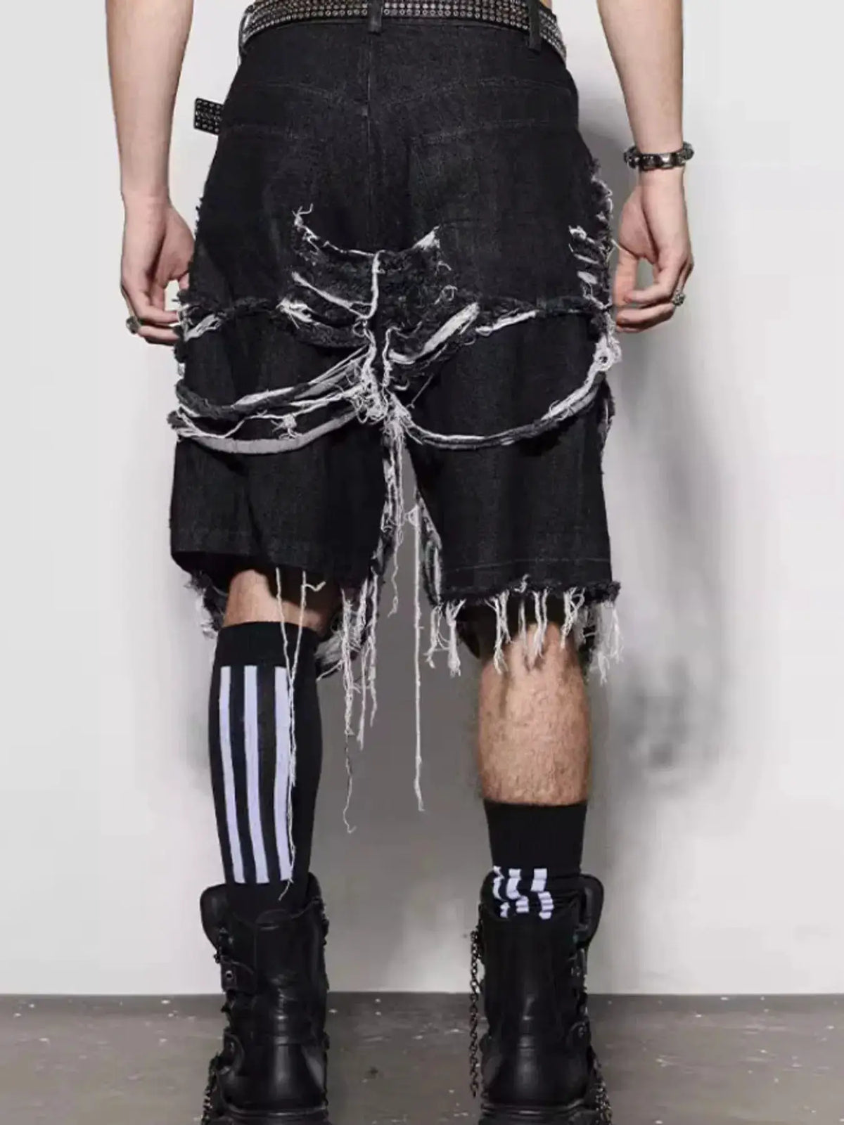 Mens frayed-hem black denim shorts with distressed panels and stud detail