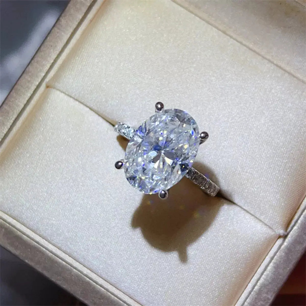 Engagement ring with 8-carat oval moissanite center, 925 sterling silver, pave-band