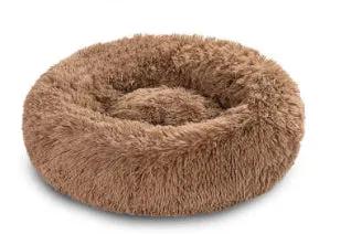 Round brown plush cat nest bed with long fur for cozy autumn and winter