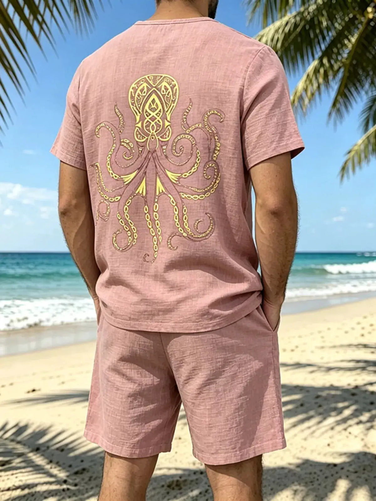 Mens two-piece pink loungewear set with tee and drawstring shorts; gold octopus back print