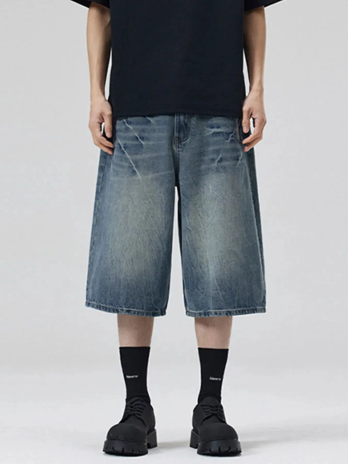 Men's oversized wide-leg faded blue distressed denim shorts
