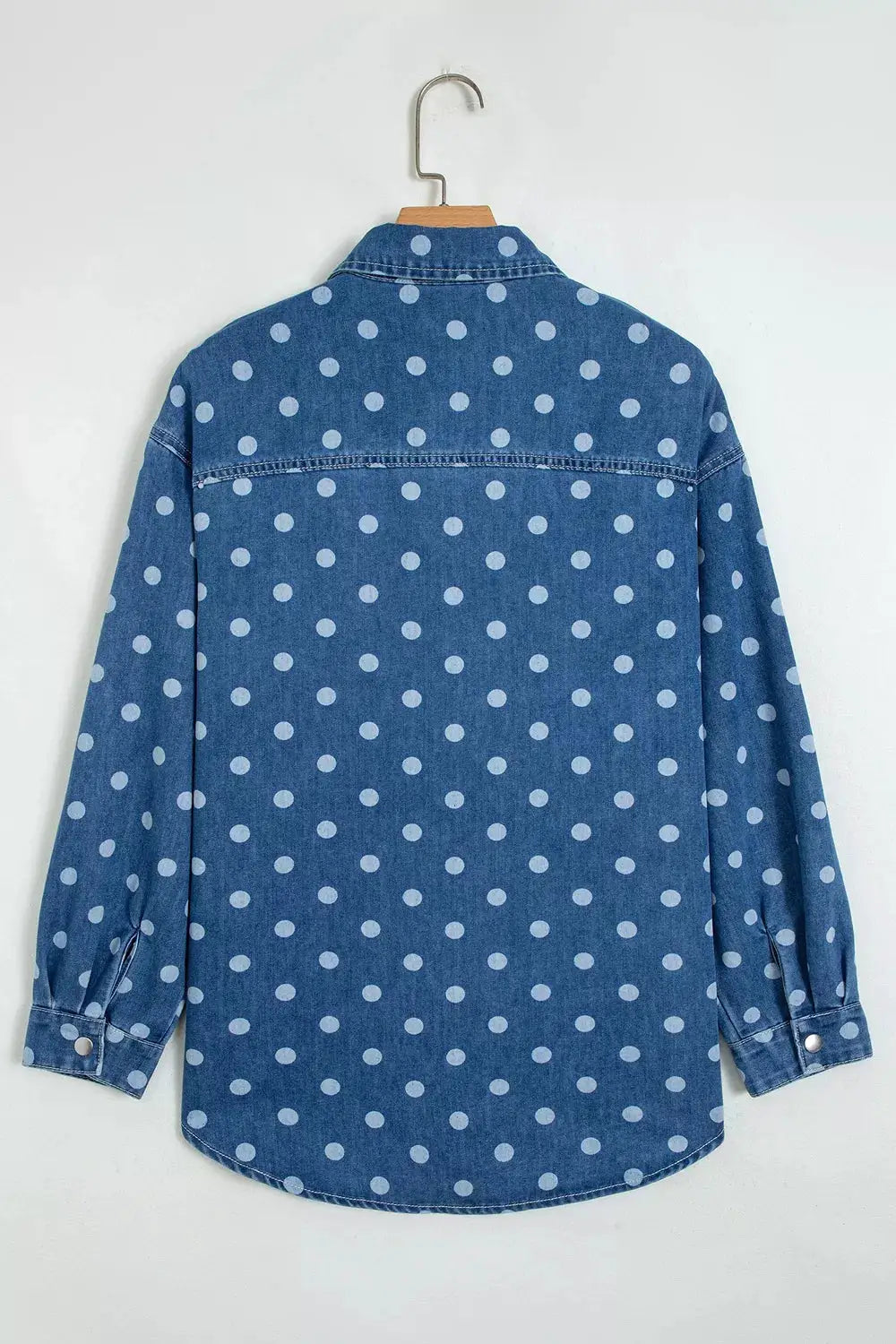 Polka dot blue denim long-sleeve tunic jacket; back view with light-blue dots
