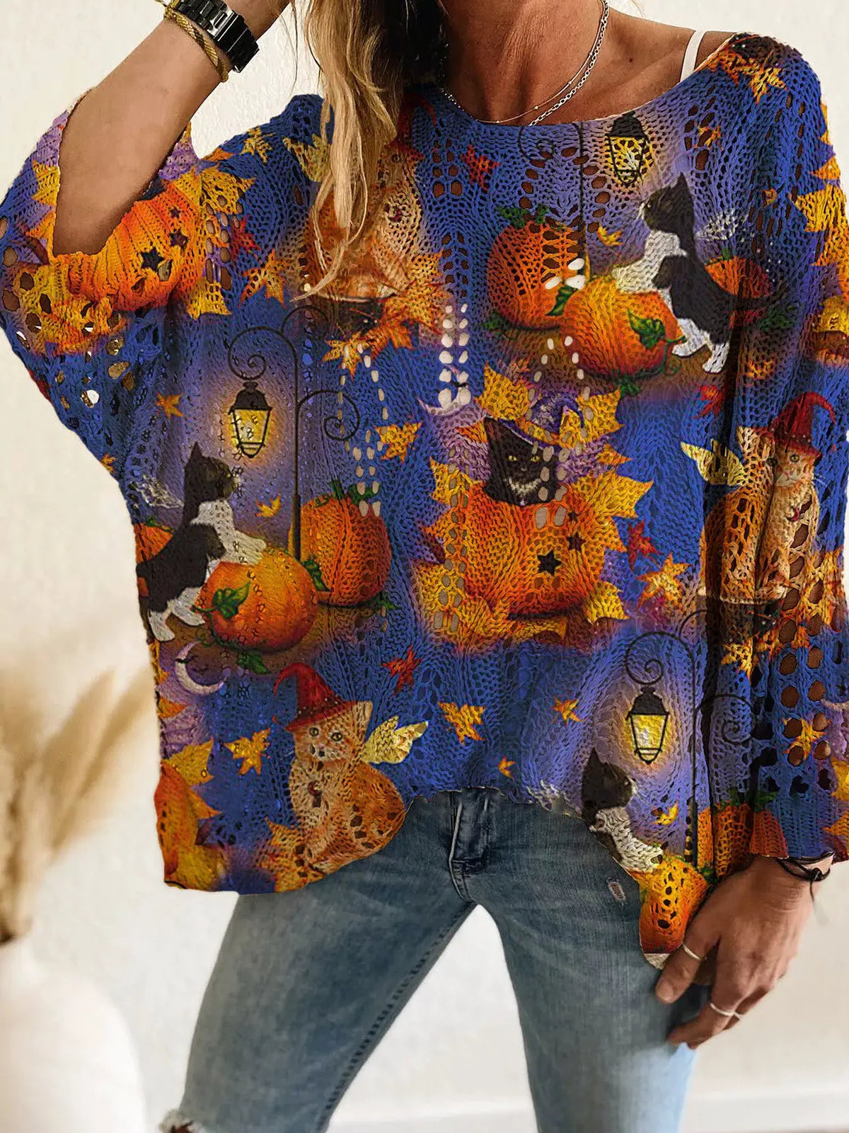 Plus-size Halloween pumpkin loose-knit cover-up by Trendsi in blue crochet, featuring pumpkins and cats.