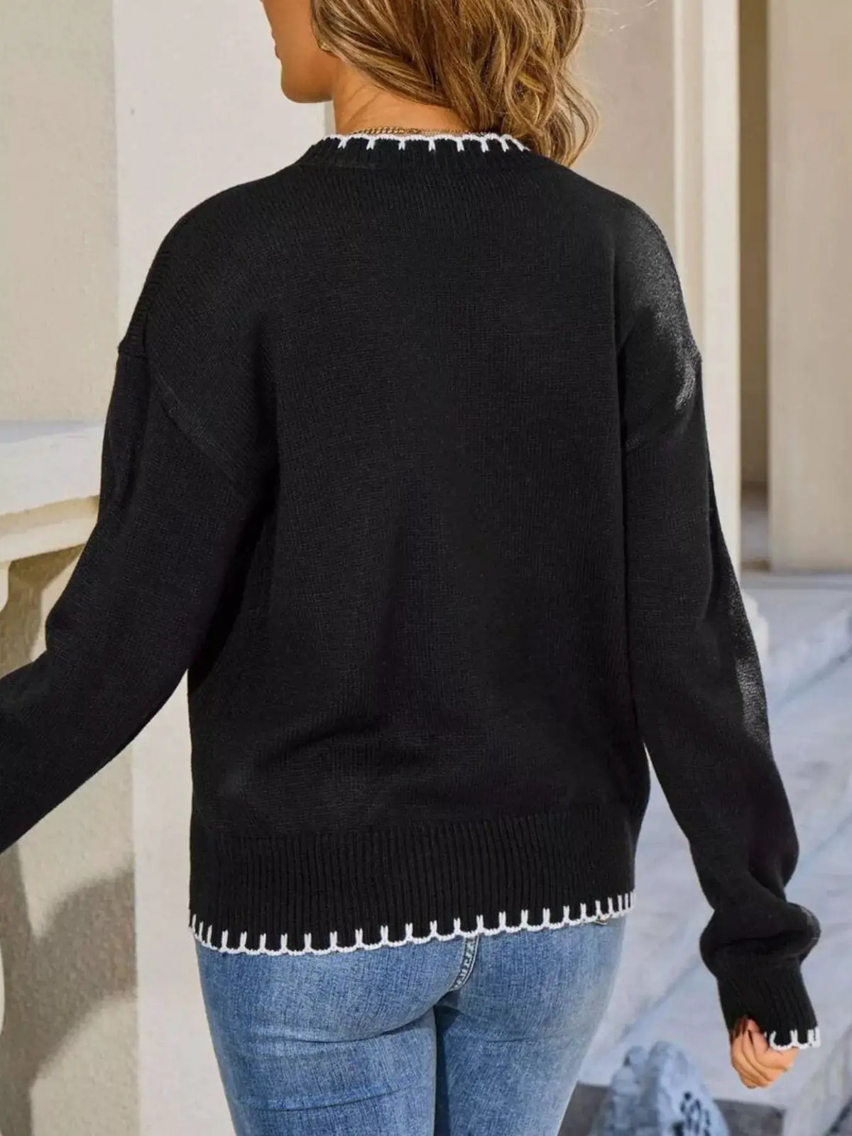 Warm Lemon Round Neck Sweater, black knit pullover with white ribbed hem trim, back view
