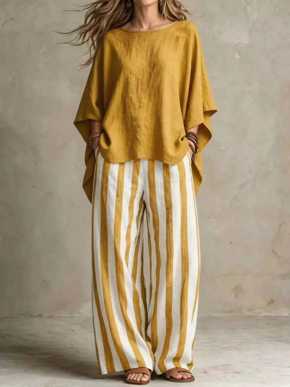 Plus-size two-piece top and pants set; solid mustard-yellow top with white-and-mustard striped pants, Trendsi