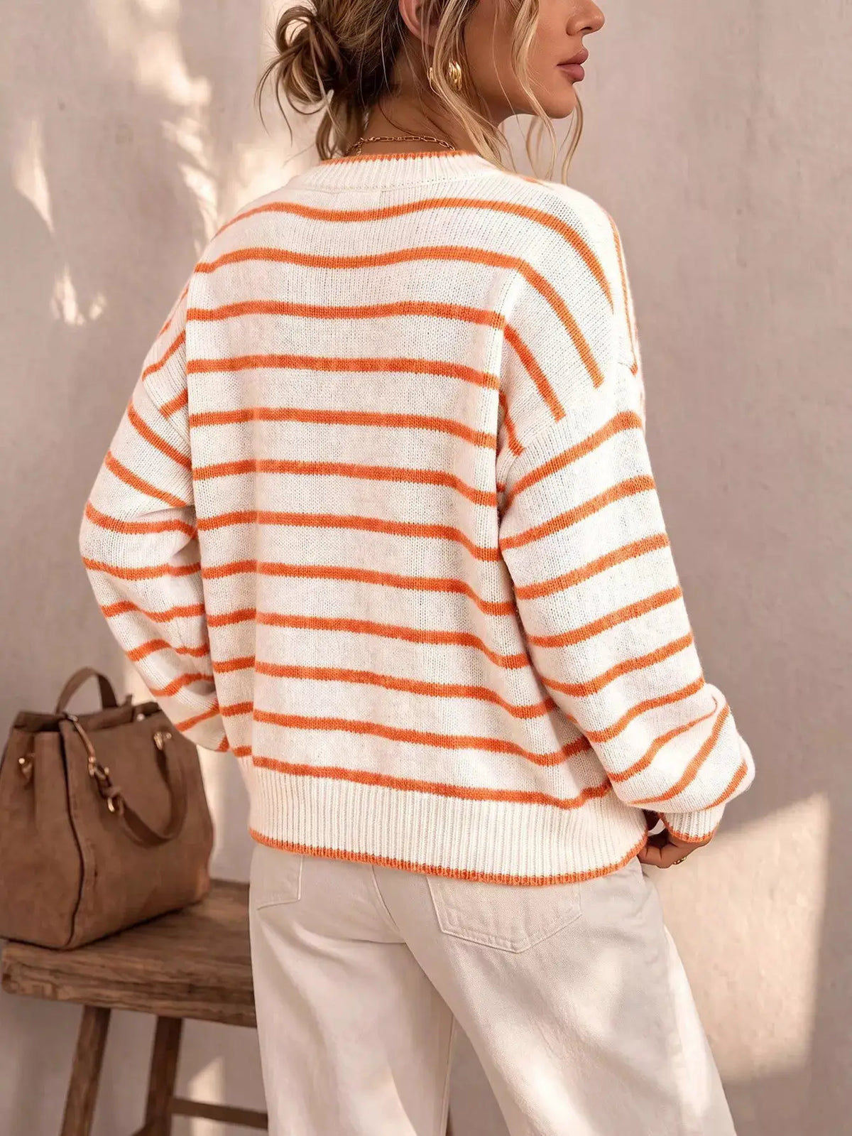 Striped knit cardigan back view, white with orange stripes, by Trendsi